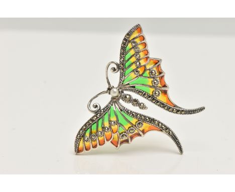 A WHITE METAL PLIQUE A JOUR BROOCH, in the form of butterfly with red, green and yellow enamel wings, marcasite and imitation
