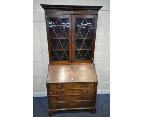 A GEORGIAN WALNUT AND MARQUETRY INLAID BUREAU BOOKCASE, with astragal glazed double doors, enclosing three adjustable shelves