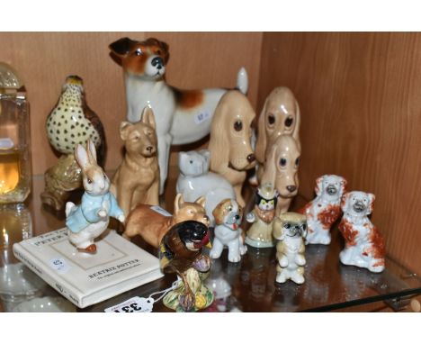 A COLLECTION OF CERAMIC ANIMAL FIGURES, to include a Beswick Peter Rabbit 'Peter on His Book' P4217, a Beswick Goldfinch no 2