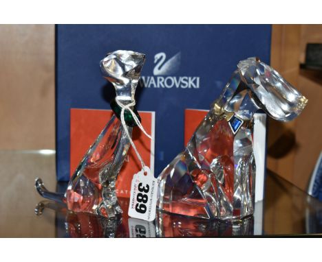TWO BOXED SWAROVSKI CRYSTAL 'SYMBOLS' COLLECTION FIGURES, comprising Symbols - Cat, model no 289478, wearing a green crystal 