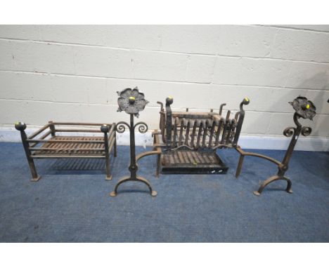 AN ARTS AND CRAFTS CAST IRON FIRE GRATE, with a rectangular basket, on a pair of andirons with copper flower heads, and tray,