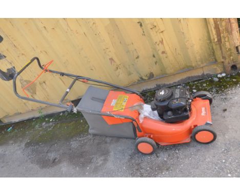 A FLYMO RL400PETROL LAWN MOWER with a Briggs and Stratton engine (pulls and starts)