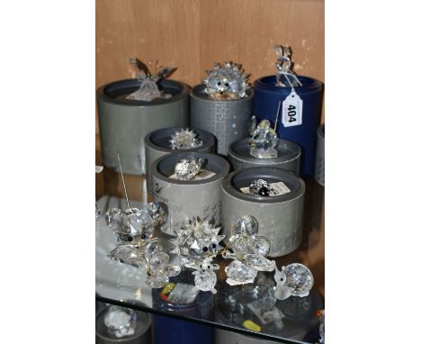 A GROUP OF SWAROVSKI CRYSTAL SCULPTURES FROM 'IN SUMMER MEADOW' AND 'IN A SECRET GARDEN' COLLECTIONS, comprising a boxed Moth
