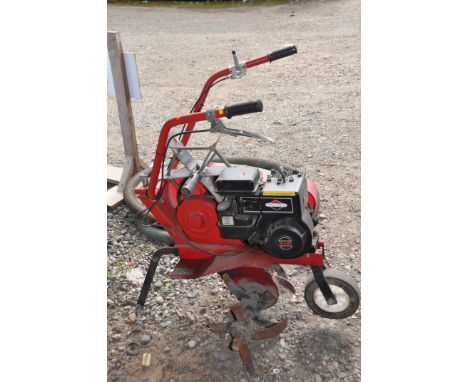 A MOUNTFIELD MANOR 3 with a Briggs and Stratton 3 hp engine (engine pulls freely but hasn't started)