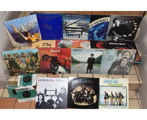 THREE THE BEATLES SINGLES AND EIGHTEEN LPS, TOGETHER WITH A 'FENDER' WALL MOUNT GUITAR HANGER, the records include three Parl