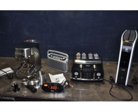 A COLLECTION OF FIVE HOUSEHOLD ELECTRICAL ITEMS comprising of a Sage SES500 coffee maker, a Philips clock radio, a Roberts Cl