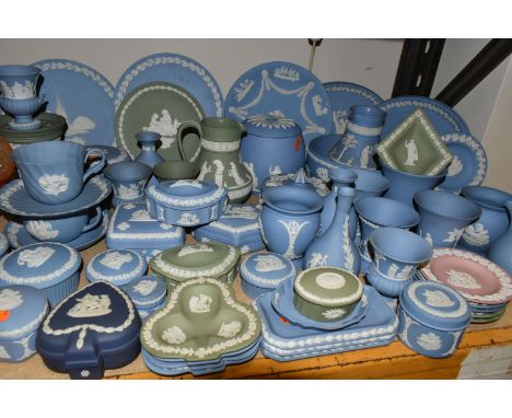 A QUANTITY OF WEDGWOOD JASPERWARES, over sixty pieces to include jugs, vases, a covered vase height 13cm, two teacups and sau