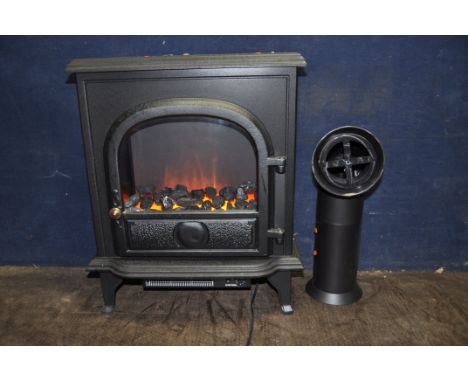 A CREATIVE FIRES MODEL 2.50 COAL FIRE EFFECT FAN HEATER with illuminated coals and fake flue width 56cm x depth 22cm x height