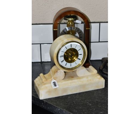 TWO MANTEL CLOCKS, comprising a cream marble French made clock stamped Deposé 17092, height 23cm, a German made Franz Hermle 