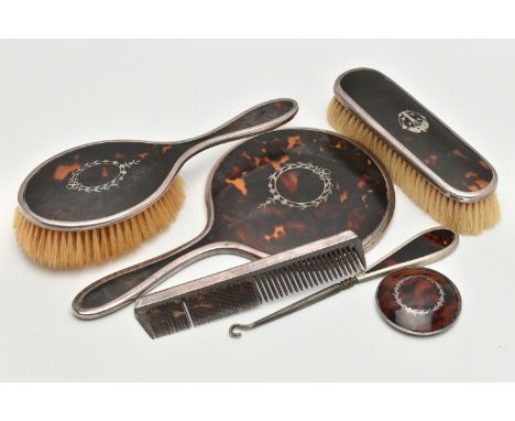 SIX DRESSING TABLE ITEMS, to include a silver and tortoiseshell hand held mirror and brush set, silver hallmark for Birmingha