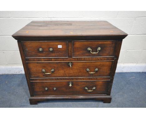 A GEORGIAN STYLE OAK CHEST OF TWO SHORT OVER TWO LONG DRAWERS, incorporating 18th century timbers, with brass swan neck handl