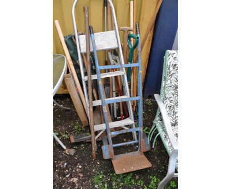A SELECTION OF GARDEN TOOLS, A VINTAGE SACK TRUCK AND A STEP LADDER including pickaxe, spades, forks, shovels etc