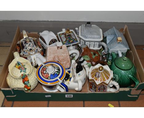 A BOX OF TWELVE TEA POTS, MOSTLY NOVELTY TYPE, including a Clarice Cliff Celtic Harvest example, a 19th century Derby porcela