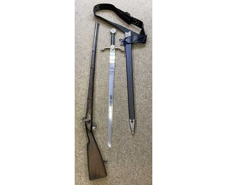 CIRCA 18TH CENTURY MUSKET, 143cms, and an ornamental sword and scabbard