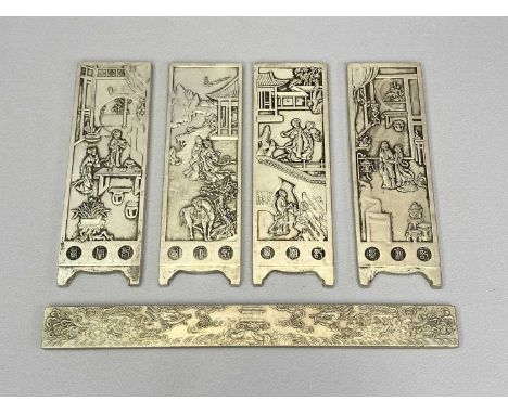 CHINESE SILVER SCROLL WEIGHTS (5) - to include a single bar example decorated with dragons and fish in relief, 23cms L and a 