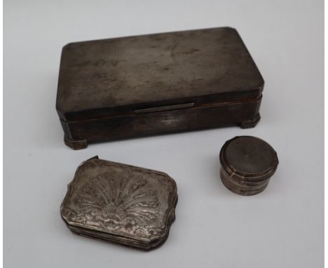 An Elizabeth II silver cigarette box and cover of rectangular form with engine turned decoration, Birmingham, 1966 together w
