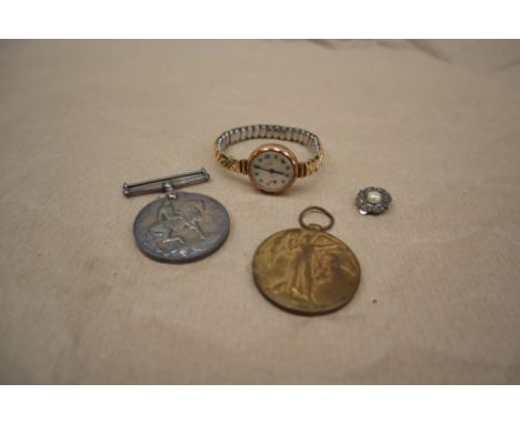 A lady's 9ct gold Excaliber wristwatch, with a silvered dial and Arabic numerals on an expanding bracelet strap, and two Worl
