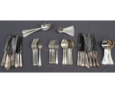 An Elizabeth II silver part flatware service comprising twelve silver handled table knives, twelve silver handled side knives