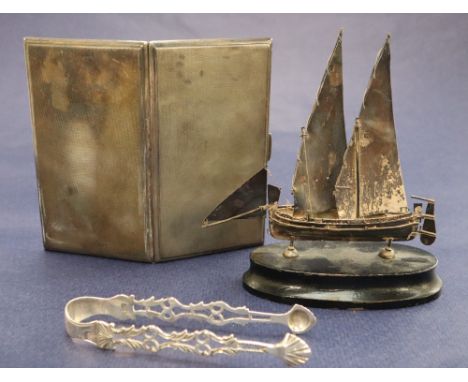 A George V silver cigarette case of rectangular form with engine turned decoration, Birmingham, 1943 together with a pair of 