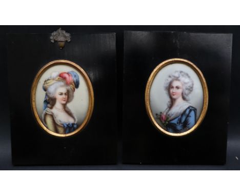 A pair of porcelain portrait miniatures depicting Ladies in dresses, 8 x 6.5cm