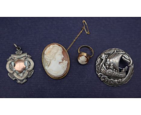 A shell cameo brooch with a lady in profile to a 9ct gold setting, 40mm x 28mm, together with an 18ct yellow gold cameo ring,