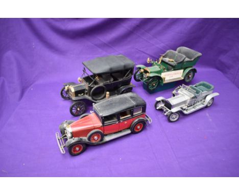 Four Franklin Mint 1:24 scale diecast models, 1935 Mercedes Benz 770 K Grosser, 1907 Rolls Royce Silver Ghost, 1905 Rolls Roy