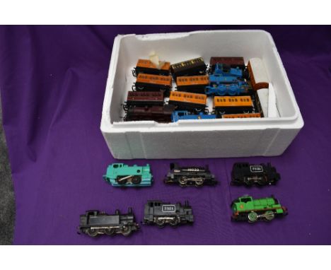 A box of Hornby and similar 00 gauge including Thomas The Tank Engine, Four Wheel Coaches0-4-0 clockwork Tank Engines etc