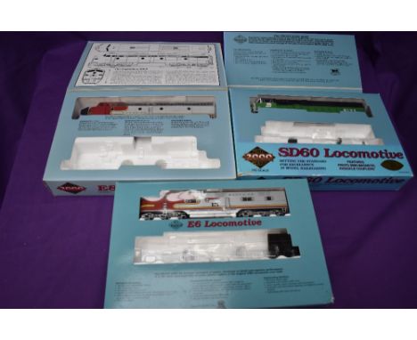 Three Proto Series 2000 HO scale Locomotives, Santa Fe E8/9 boxed 8035, limited edition BNSF SD60 boxed 23510 and limited edi