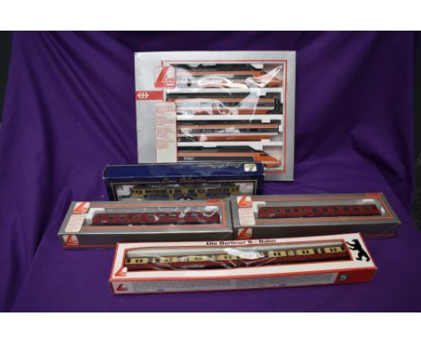 A small collection of Lima 00 gauge comprising TGV SNCF Passenger Train set, boxed 149720, DSB 2 Car DMU, both boxed 201092L 