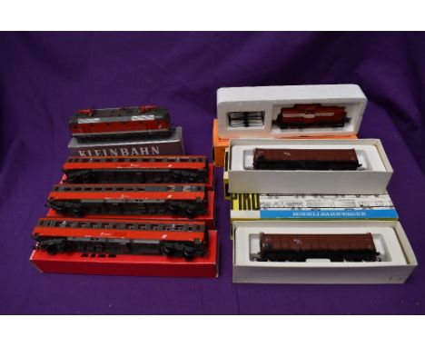 A Kleinbahn HO scale Locomotive 1044 209-3 and three Wagons, all boxed along with a Piko HO scale GDS Locomotive and two Wago