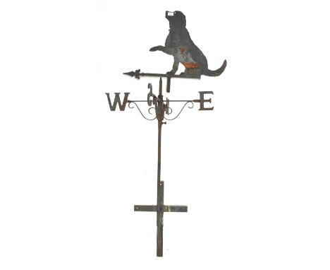 A cast and wrought iron weather vane with an ornament in the form of a seated gun dog, 147cm high 