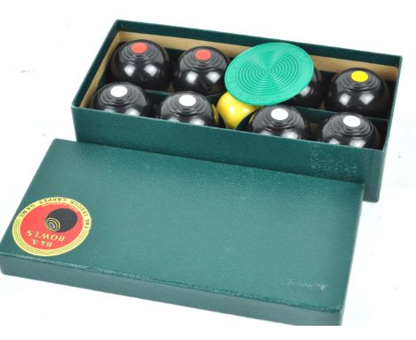 A boxed set of Brookes and Adams carpet bowls, 7cm high x 29cm wide x 14cm deep