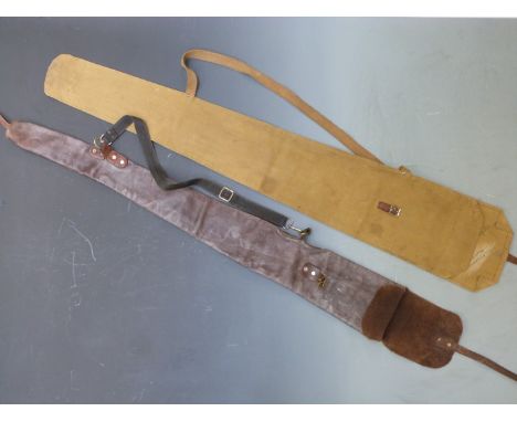 Two vintage gun slips, one leather the other canvas.&nbsp;