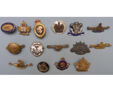 Fifteen military pin back badges including Denbighshire Hussars marked sterling to reverse, Royal Naval Volunteers, RMS Maure