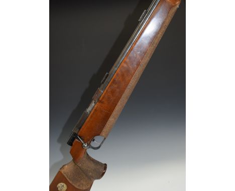 Anschutz Match 54 .22 target rifle with adjustable trigger and butt, shaped semi-pistol grip, raised cheek piece and 27 inch 