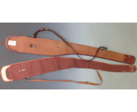 Two vintage gun slips, one Holland and Holland the other Brady, both with original labels.&nbsp;