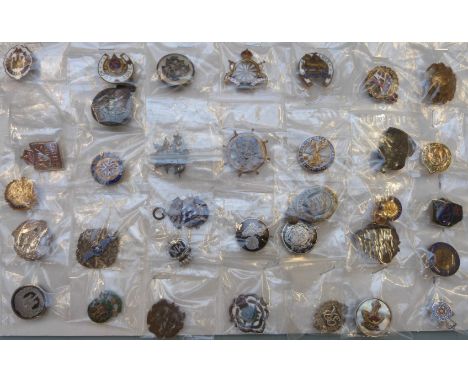 Thirty four Regimental Military/ Home Defence lapel/ pin badges including Durham Light Infantry, Essex Regiment, Cameron High