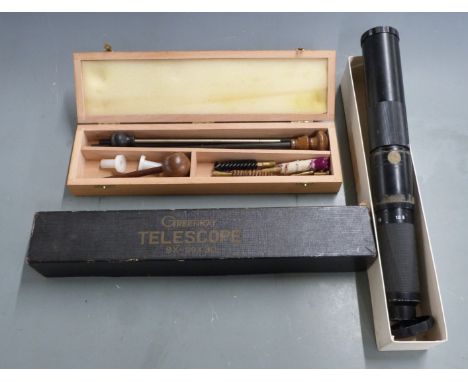 Greenkat 9-30x30 spotting or rifle scope in original box, together with a shotgun cleaning kit in wooden box.&nbsp;