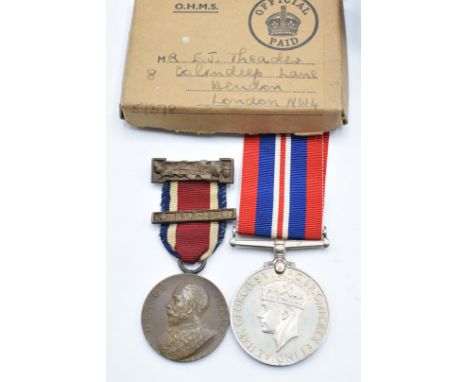 British Army WW2 War Medal with postal address box to E J Thaeder London together with a London County Council medal and Germ