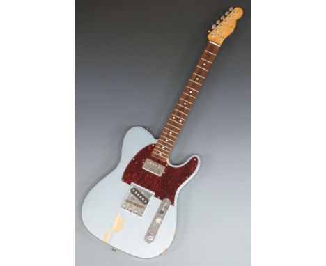 Stratocaster style electric guitar with Wilkinson Sung-II pickup, teal blue glitter lacquer finish, red pearloid finger plate