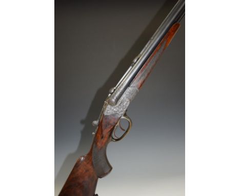 August Wolf Suhl 16 bore and 8mm x 57 drilling combination rifle and shotgun with heavily engraved locks, barrels, top plate 