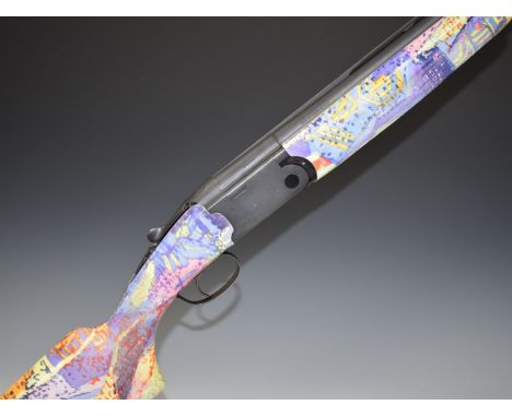 Beretta 686 Essential 12 bore over and under ejector shotgun with signed black lock, custom colored camo stock and forend, se