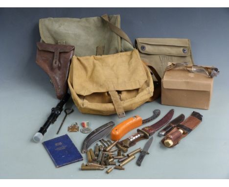 Military / sporting ephemera including leather pistol holder, two Queen Victoria commemorative medals, canvas bags, inert amm