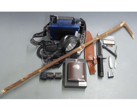 A collection of gun and shooting related items including Nightsearcher 750, Rambo First Blood Bowie knife, David Nickerson hi