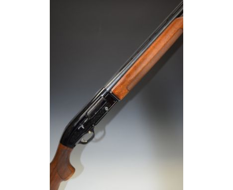 Beretta A303 12 bore three shot semi-automatic shotgun with named and engraved locks, chequered semi-pistol grip and forend, 