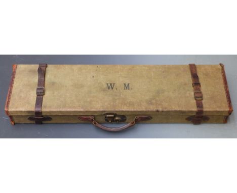 Vintage canvas and leather bound shotgun case with fitted interior and original label 'T. Stensby &amp; Co Gun, Rifle &amp; C