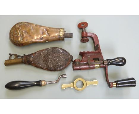 G &amp; J W Hawksley 12 bore shotgun cartridge rollover tool together with a nipple key, a brass cartridge decapper, a copper