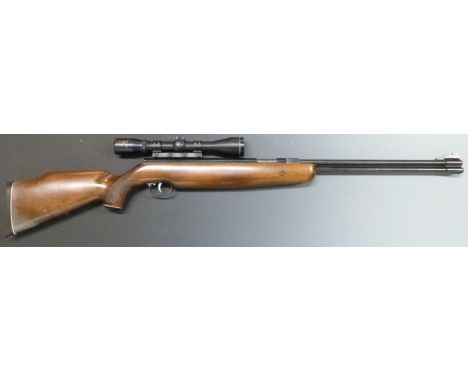 Weihrauch HW77 .22 underlever air rifle with chequered semi-pistol grip, raised cheek piece and Nikko Stirling Gold Crown 6x4