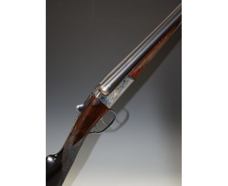 AYA 12 bore side by side ejector shotgun with named and engraved locks, engraved underside, trigger guard, top plate, fences 