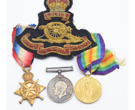 British Army WW1 medals comprising 1914-1915 Star, War Medal and Victory Medal named to 42455 Gunner R K Kennedy, Royal Garri